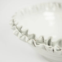 Close-up of the ruffled edge on the Claudine ceramic bowl by Olsson & Jensen