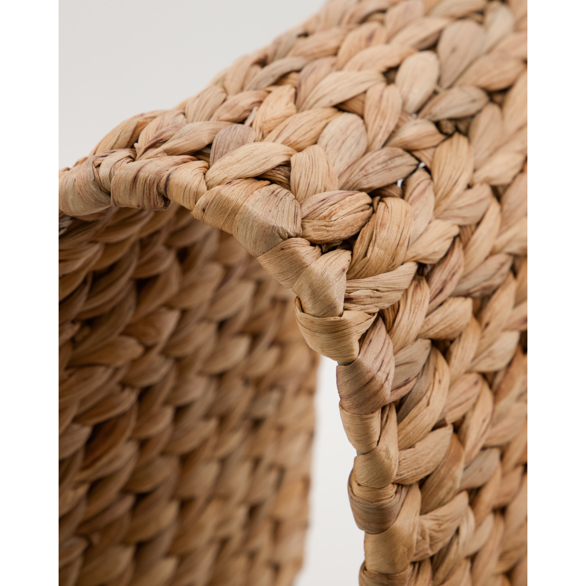 close up of woven texture on house doctor wave magazine rack
