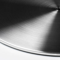 Close-up of the brushed finish on the Stainless Steel Le Feu Dome Steel Plate