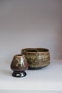 eco green matcha whisk holder with earthy glazed finish
