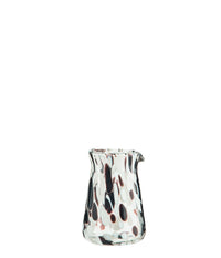 handmade glass milk jug with brown and white speckled pattern
