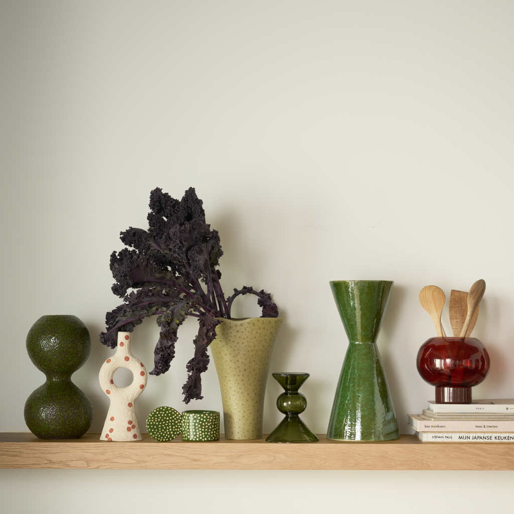 Urban Nature Culture vases and candle holders on a wooden shelf