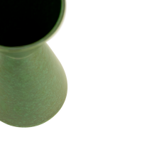 Close-up of the Faen vase's rim and glossy green reactive glaze
