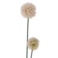 Faux phlox flowers displayed in neutral ceramic vase