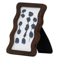 Flette walnut photo frame at an angle, showing the black back stand