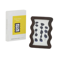 Flette photo frame beside its Urban Nature Culture gift box