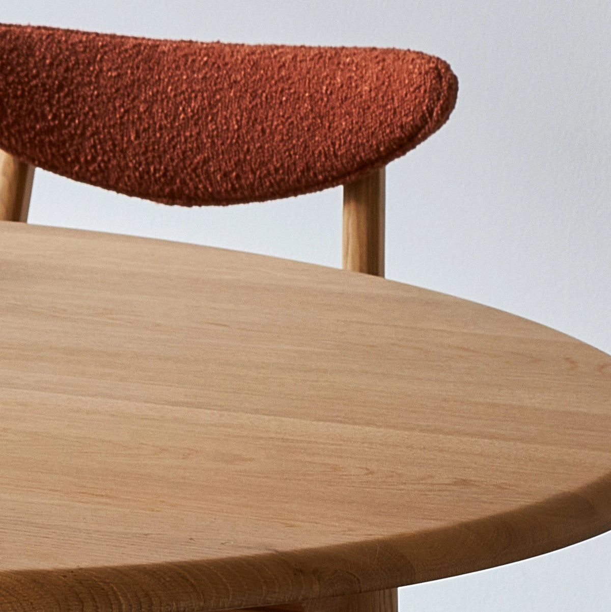 Close-up of the solid ash frame on the Fox Round Dining Table by 366 Concept