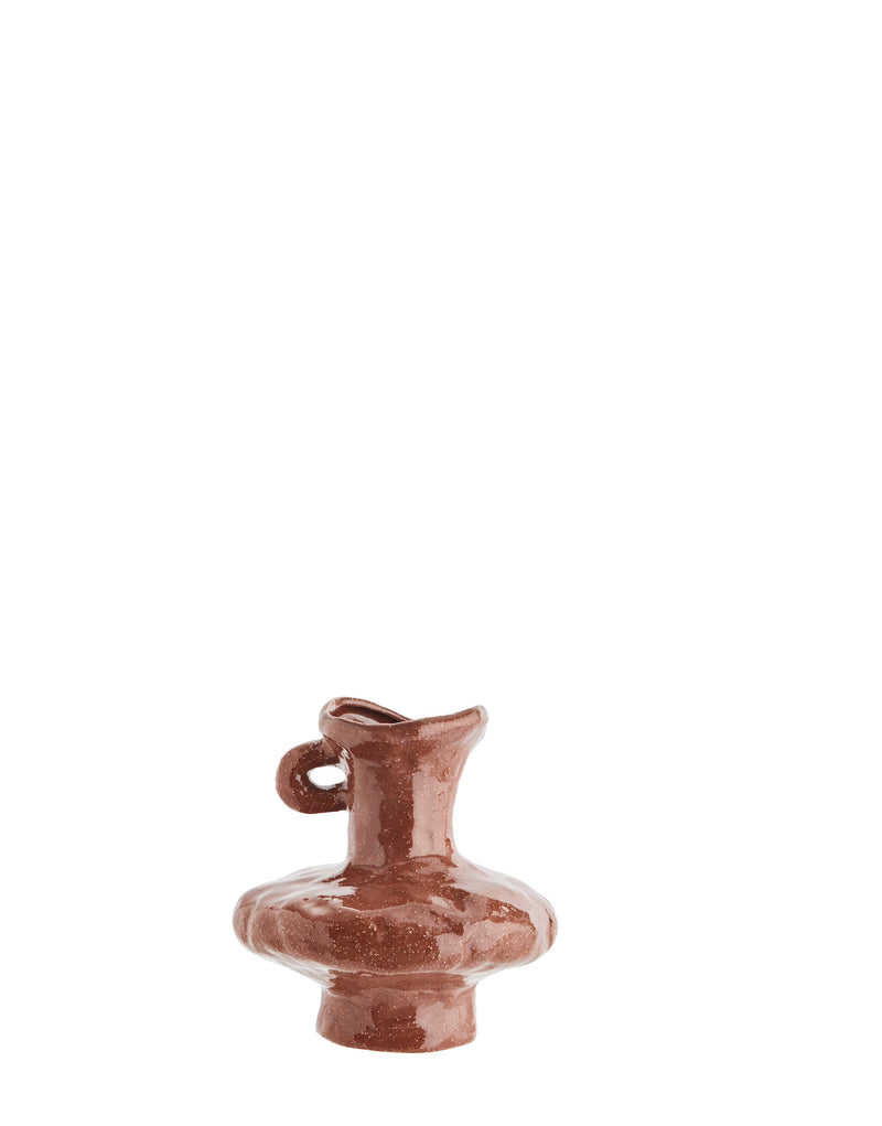 small sculptural brown stoneware vase with glossy finish
