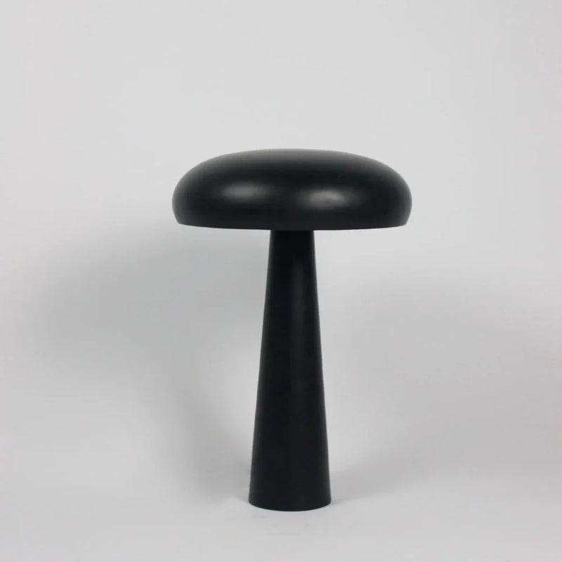 Fungi black metal mushroom table lamp by Olsson & Jensen on a white background