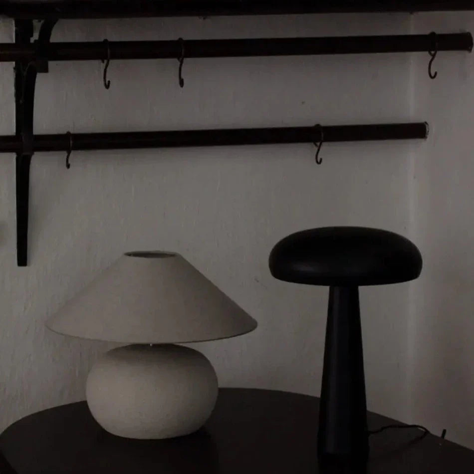 Grace small shade on a Colmar base beside a black Fungi lamp by Olsson & Jensen