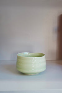 top view of handmade pastel green matcha bowl showing organic rim shape