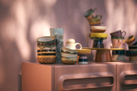retro 70s ceramics tapas bowls by hkliving styled on shelves with warm tones
