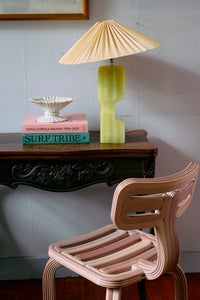 lime column table lamp base by HKLIVING styled with books and soft ivory shade