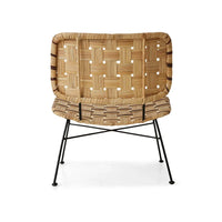 natural hkliving rattan lounge chair shown at an angle highlighting wide seat
