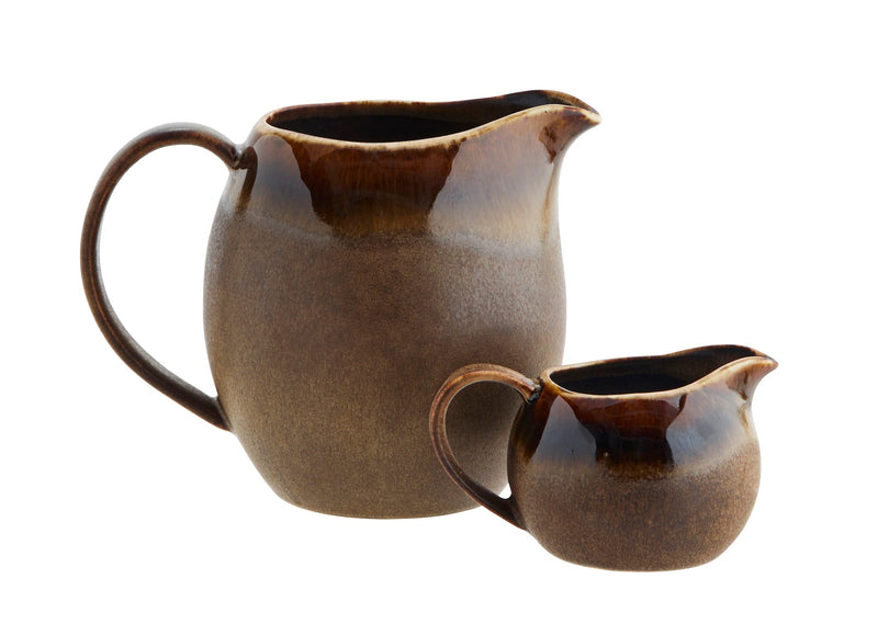 brown stoneware jugs in two sizes with reactive glaze and glossy rim