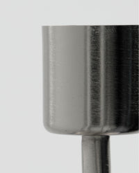 Close-up of the brushed silver finish on the House Doctor Anit candle cup