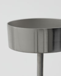 Close-up of the brushed silver tealight cup on the House Doctor Anit tealight holder