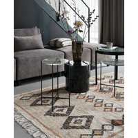Tamu side table by House Doctor styled in a modern living room setting with neutral tones
