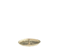 cut out of iron incense holder in antique brass showing handmade texture
