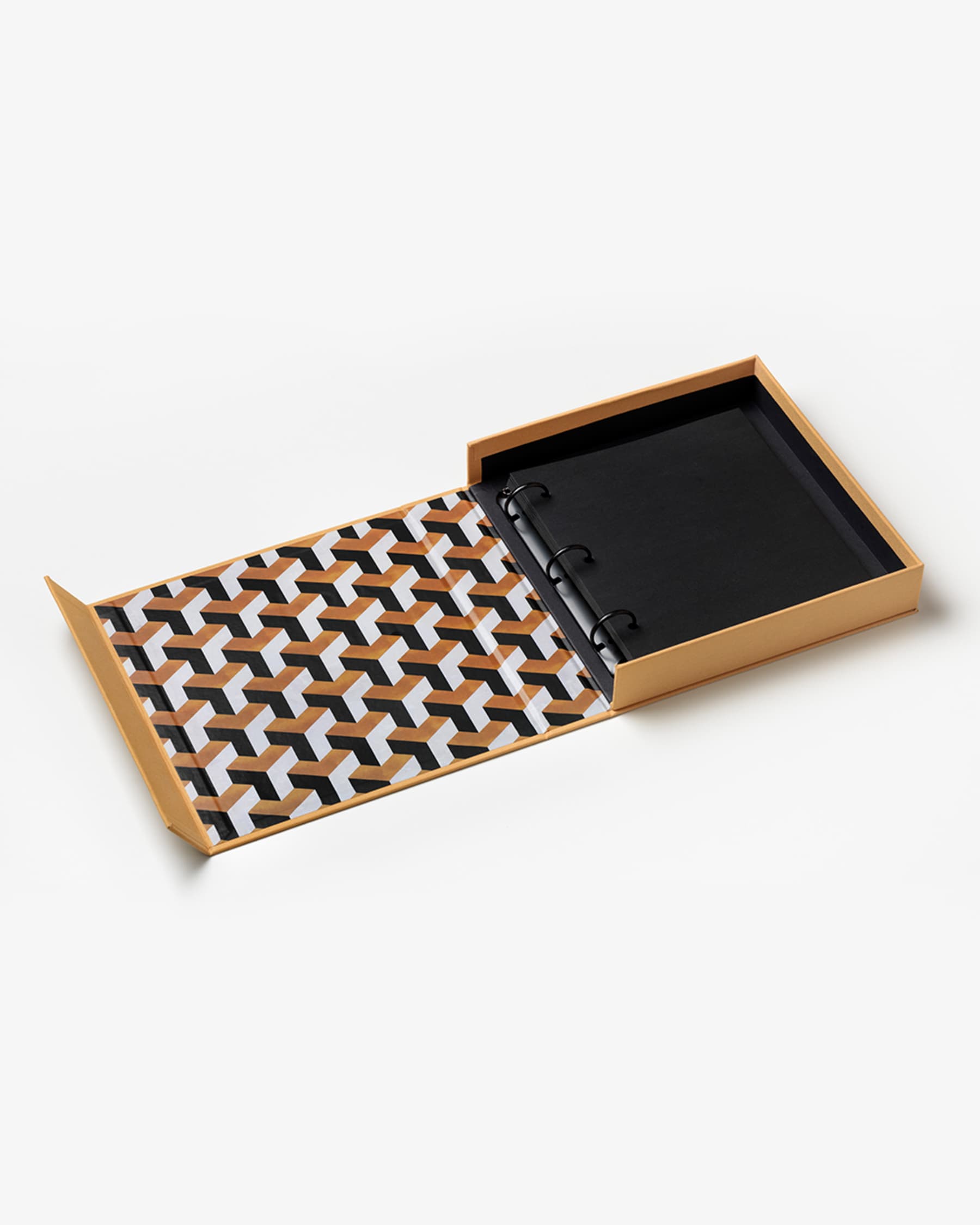 open Good Times small photo album showing patterned lining and black pages
