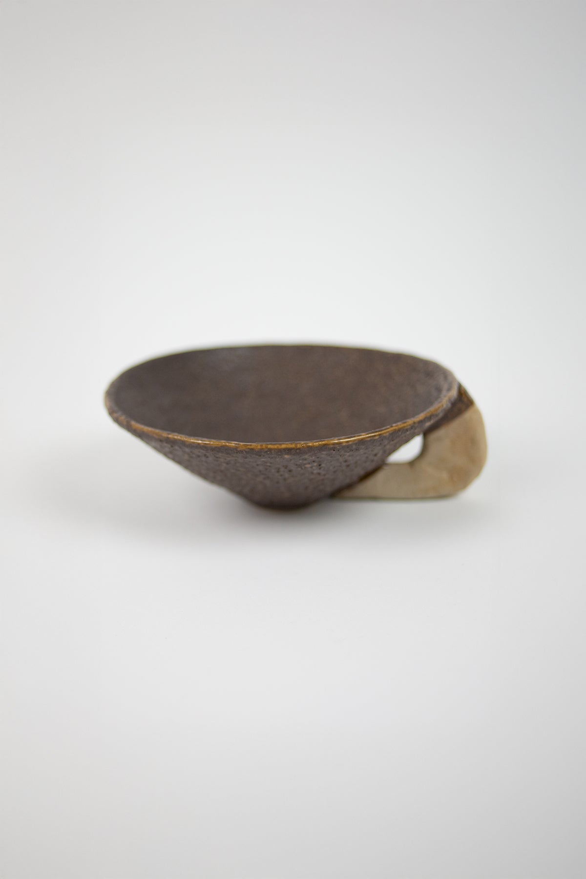 Jin stoneware bowl with a brown and beige reactive glaze by Olsson & Jensen