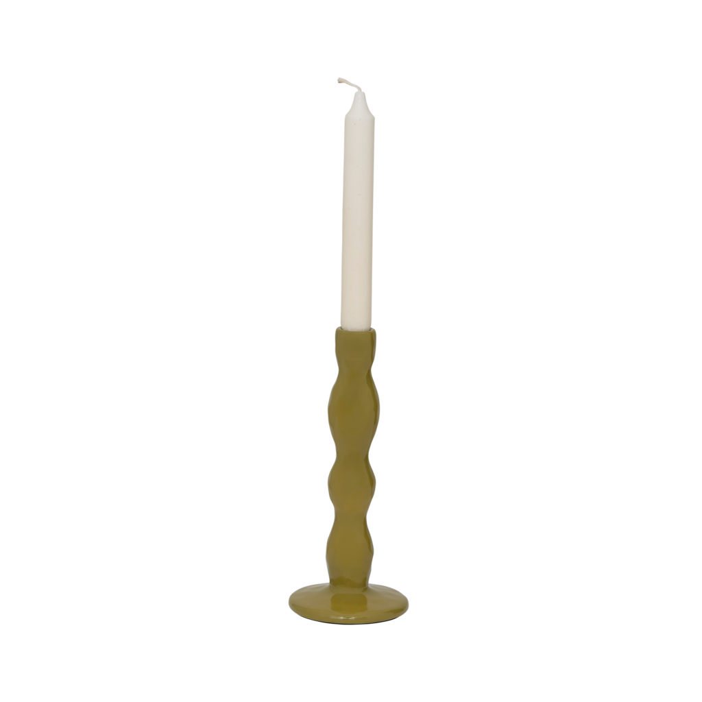 Karn olive green candle holder with an ivory dinner candle