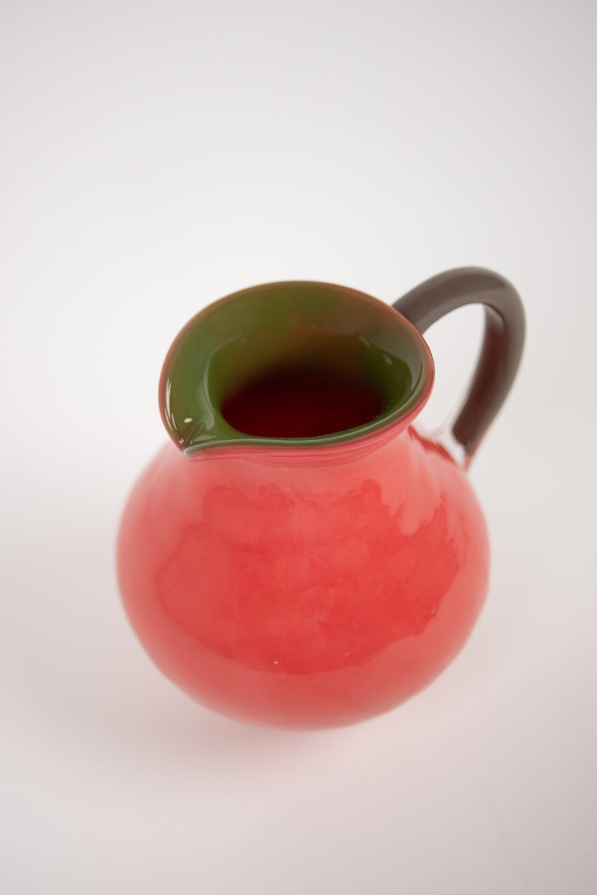 Close-up of the green inside of the Kiko coral jug by Olsson & Jensen