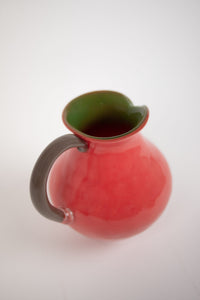 Side view of the Kiko coral jug and handle by Olsson & Jensen