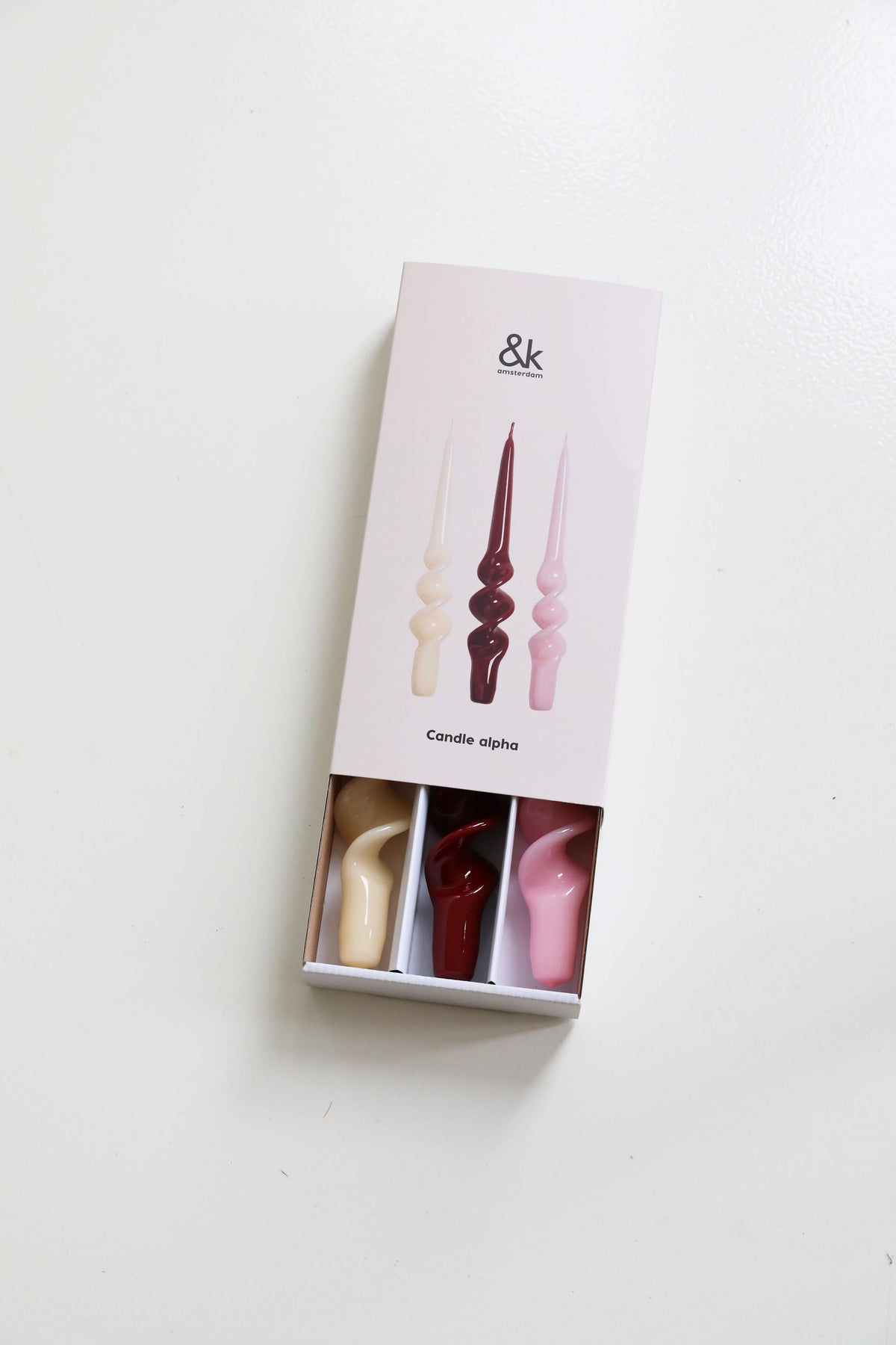 &klevering candle alpha reds set presented in a gift box of three spiral tapers
