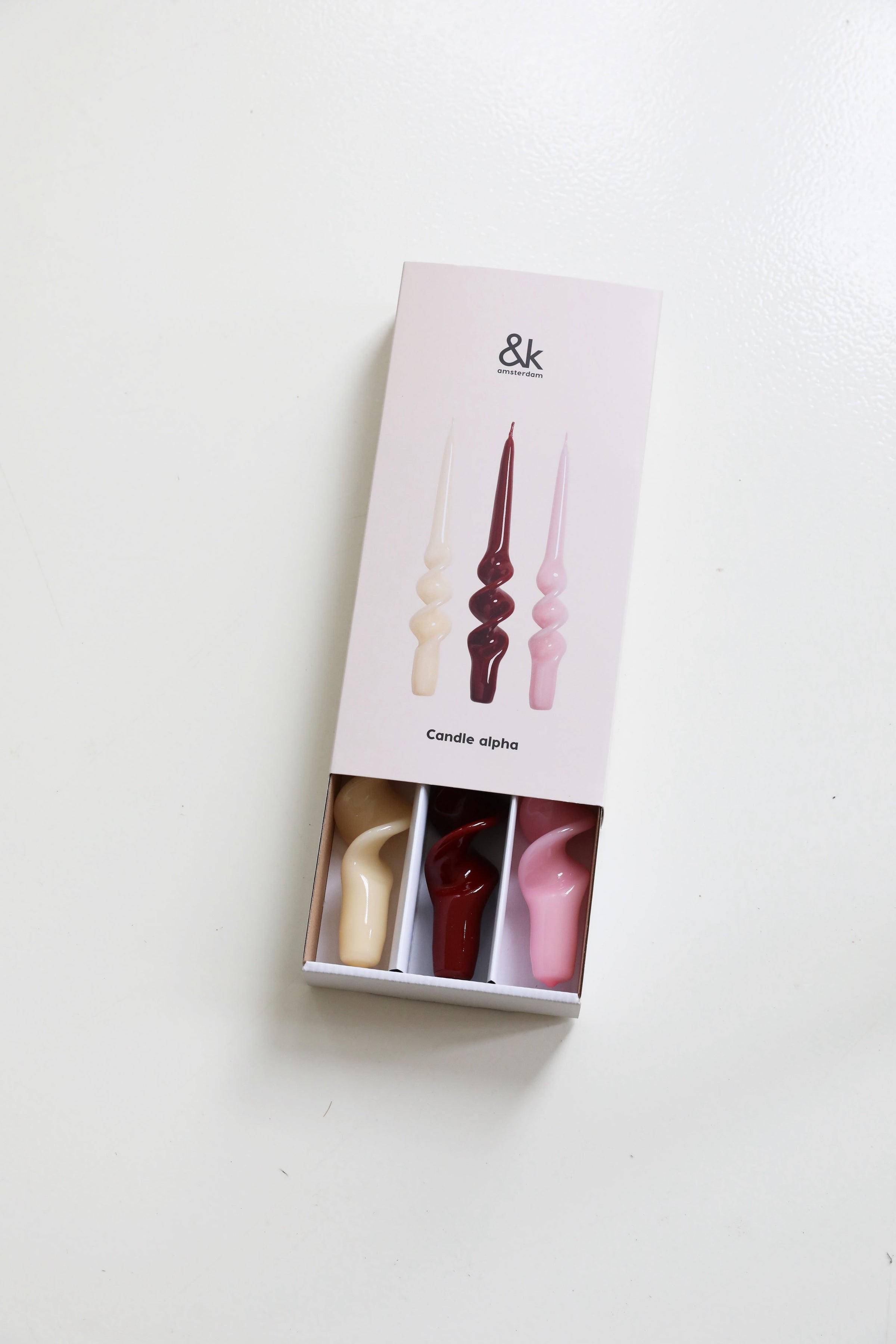 &klevering candle alpha reds set presented in a gift box of three spiral tapers
