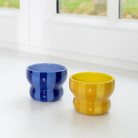 &klevering circus mugs mixed colours blue and yellow showing glossy striped finish
