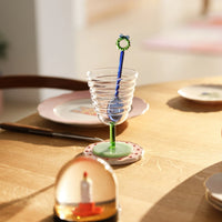 green goblet mingle glass by &klevering styled on dining table with drink