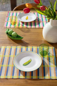 playful dining table scene with &klevering pea pod shakers and colourful placemats