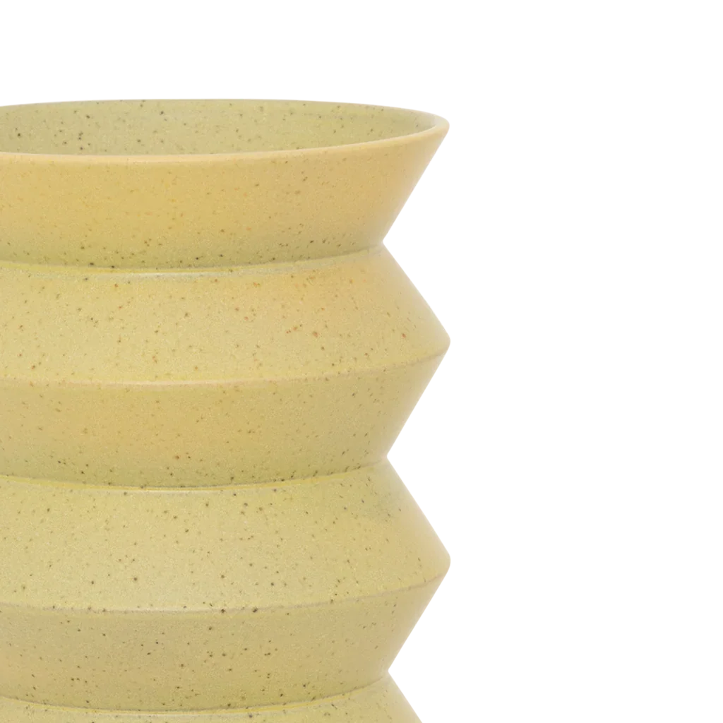 Close-up of the stacked zigzag ridges on the pale lime Kova vase
