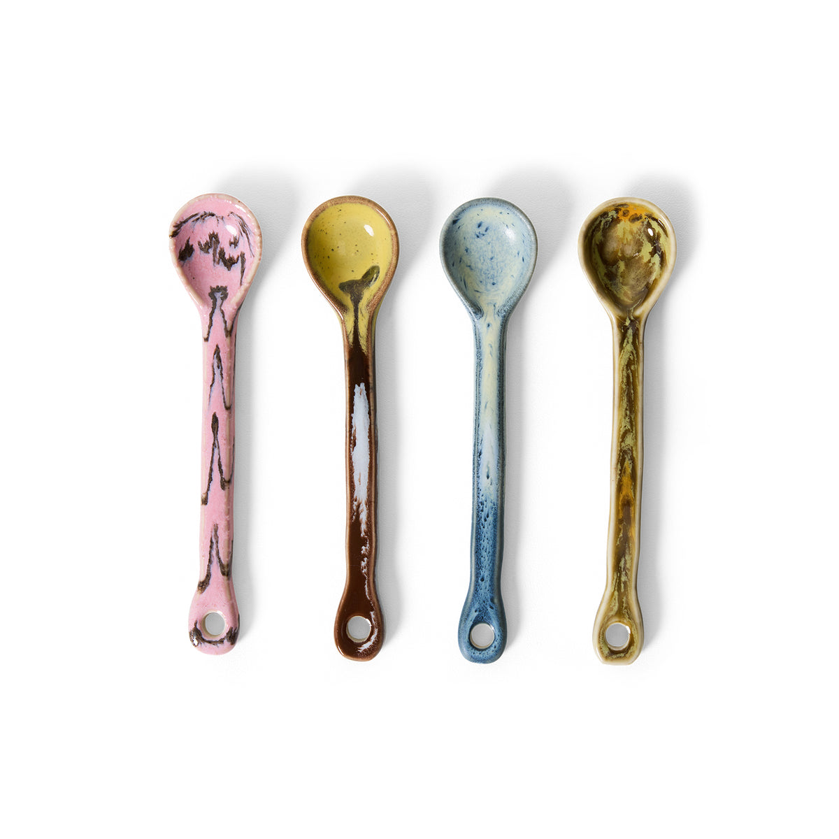 A close overhead view of the HKLIVING Sketch spoons, set of 4, laid side by side on a plain white background, showing the hand-painted glaze on each handle