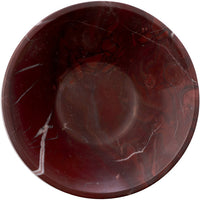 Top-down view inside the burgundy Marnine marble bowl showing white veining
