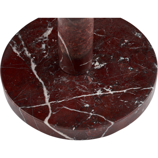 Close-up of the round burgundy marble base of the Marnine kitchen roll holder showing white veining