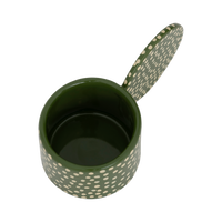 Looking into the glossy green interior of the Lucan tealight holder