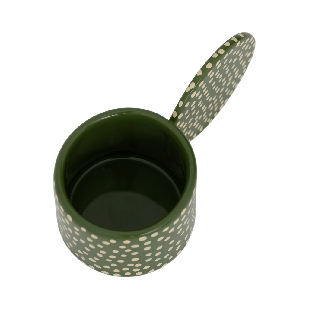 Looking into the glossy green interior of the Lucan tealight holder