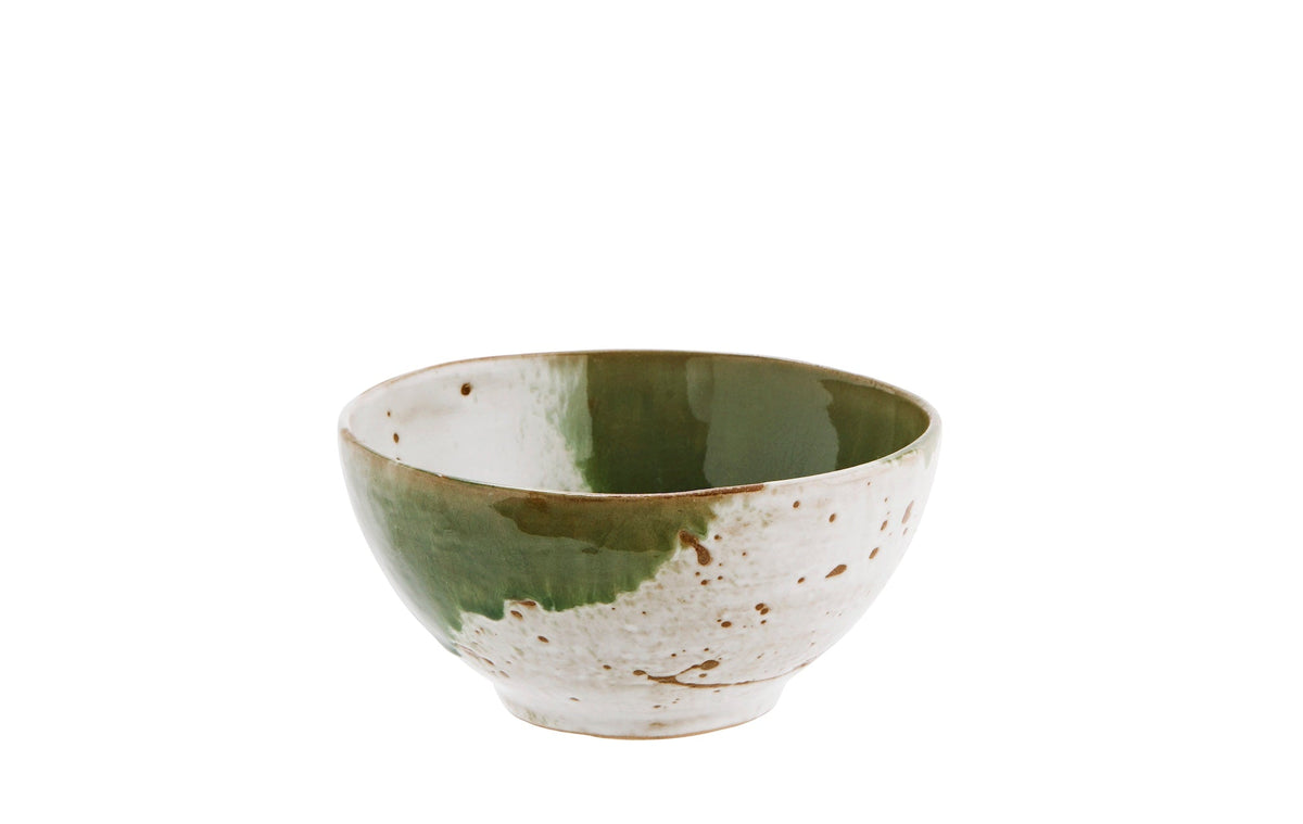 white and green stoneware bowl with unique reactive glaze finish
