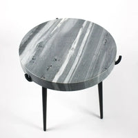 Marwin side table by Olsson & Jensen with a grey marble top and black legs