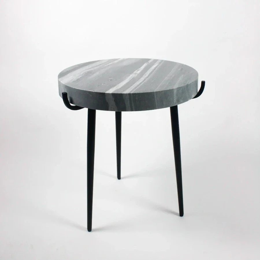 Side view of the Marwin grey marble side table by Olsson & Jensen