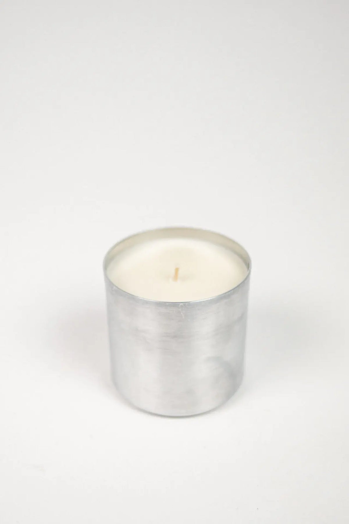Mauro blood orange and grapefruit candle refill in a metal tin by Olsson & Jensen