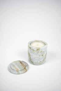 Mauro green marble scented candle with the lid removed by Olsson & Jensen