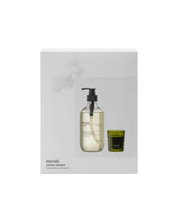 Meraki Winter Whisp hand soap and Winter Woods candle gift box, white with a botanical illustration