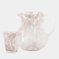 Milano pink glass tumbler beside the matching Milano jug by Olsson & Jensen