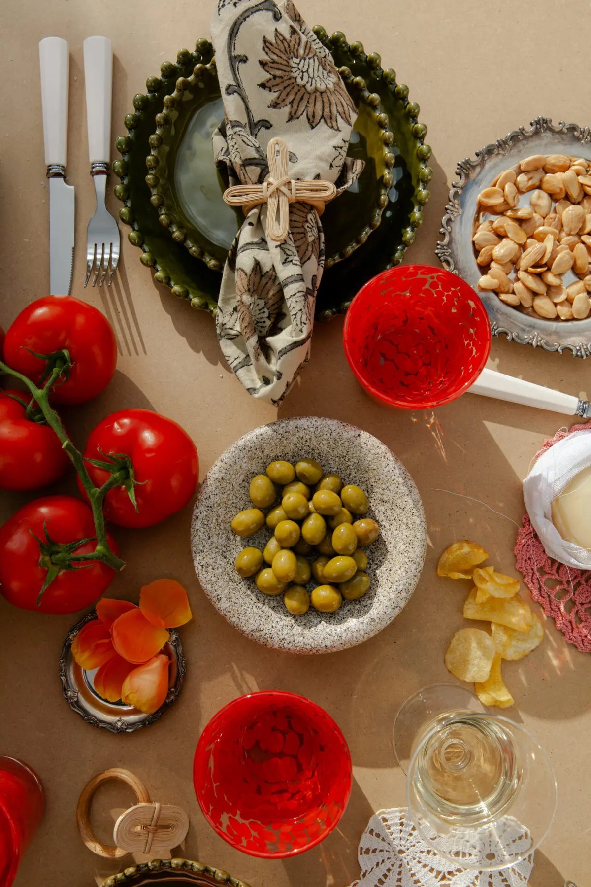 Milano red glassware by Olsson & Jensen styled on a lunch table from above