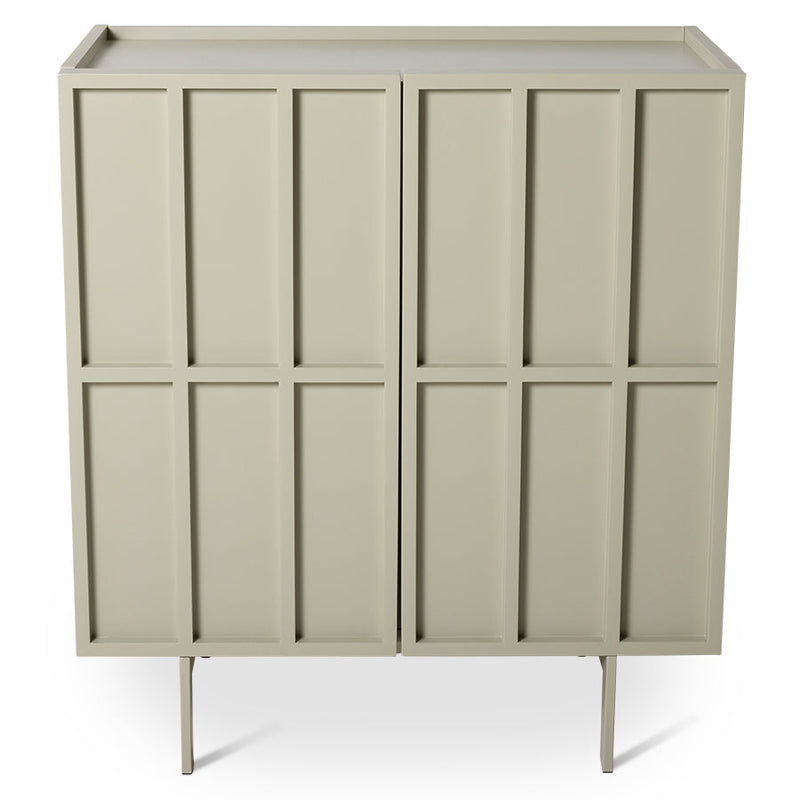 Pebble grey HKLIVING block cupboard, three-quarter view showing the panelled doors and slim legs