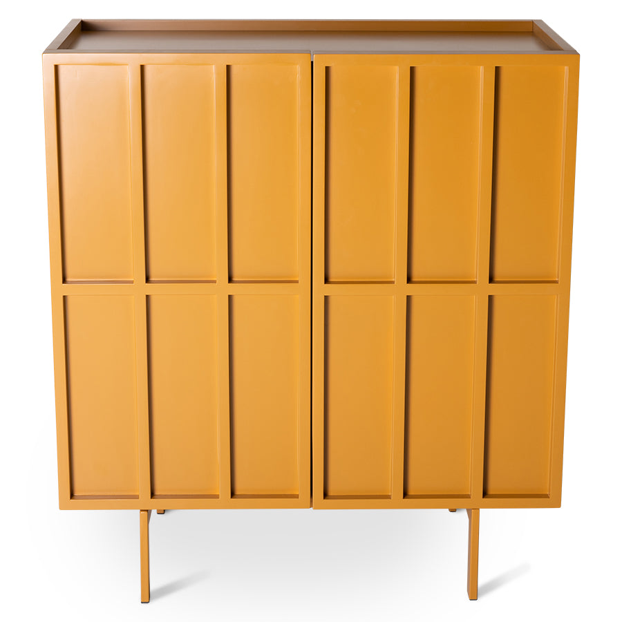 Ginger orange HKLIVING block cupboard, three-quarter view showing the panelled doors and slim legs