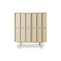 HKLIVING cupboard styled in a room, 60s-inspired cabinet with one door open against a textured brick wall